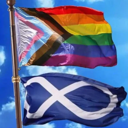 Rainbow flag and Métis Nation Flag Raised