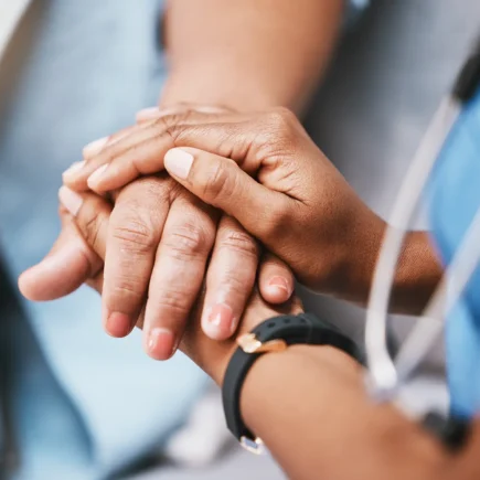 Empathy, trust and nurse holding hands with patient for help, consulting support and healthcare advice.